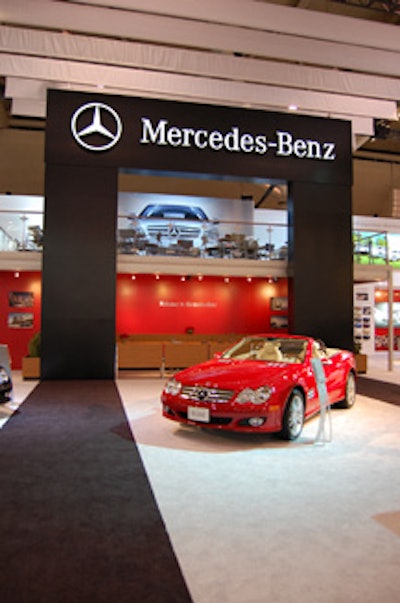 The colours of a tall display at Mercedes continued into the carpet, creating an upscale, hotel-like look.