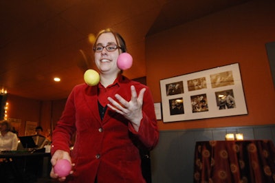 Dominique Rabideau juggled balls to entertain guests.