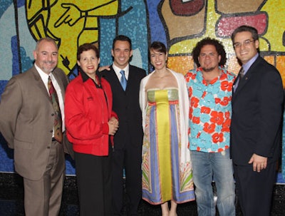 Y.M.C.A. Board chair, Gilberto Neves, Adrienne Arsht, Helio Castroneves, Kati Castroneves, Romero Britto, and Alfred Sanchez, C.E.O of the Y.M.C.A posed together for photographers.
