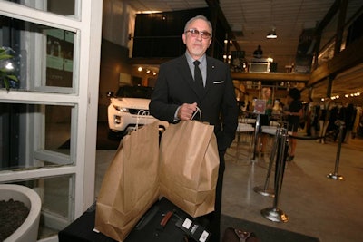 Emilio Estefan was one of the people who stopped by the Friday night party to do some shopping.