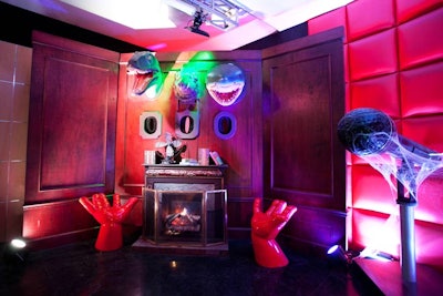 The wacky trophy wall from Max King Events will create some memorable photos for party guests. Three 10-foot tall mahogany panels are embellished with a faux fireplace and the heads of a T. rex, wild boar, and a shark. Below the animal heads are three holes for guests to put their faces in to look as if they are mounted on the wall as well. The wall rents for $2,290.