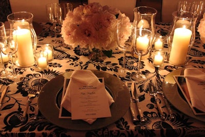 Bouquets of blush-colored peonies and soft candlelight gave the dinner area an intimate feel, while keeping the design elegant and understated.