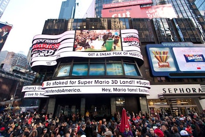 To broadcast information and videos above the gathered crowds, Nintendo took over the JumboTron outside Times Square Studios.