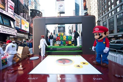 Built to look as though the environment was inside a Nintendo 3DS console, the entrance to the event was framed by over-size controller buttons and a screen-shaped doorway.