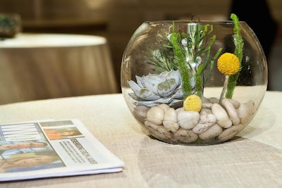 Tuesday morning's breakfast featured sand-colored linens and terrarium centerpieces.