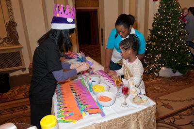At one creation station, children could decorate their own crowns.