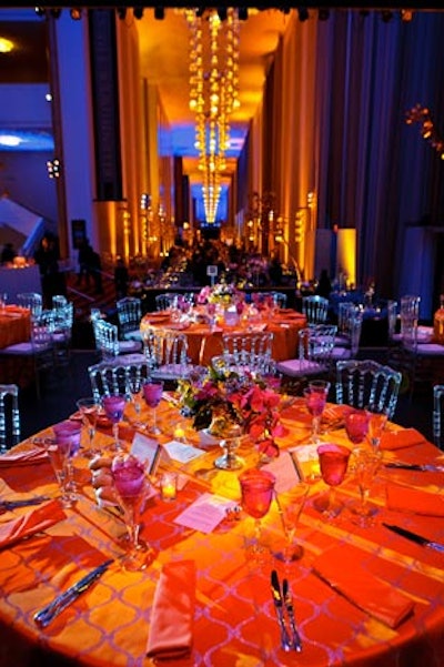 DC Rental draped the table linens in a color-block style throughout the foyer with sections of green, orange, blue, and pink.