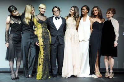 A half dozen of the models and actresses photographed for the 2012 Pirelli calendar, including Rinko Kikuchi, Natasha Poly, Isabeli Fontana, and Joan Smalls, joined Mario Sorrenti on stage.