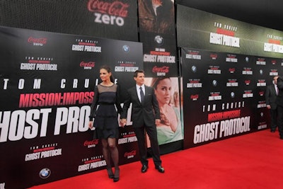 Tom Cruise and his wife, Katie Holmes, posed on the red carpet at the premiere of Mission Impossible: Ghost Protocol at the Ziegfeld.
