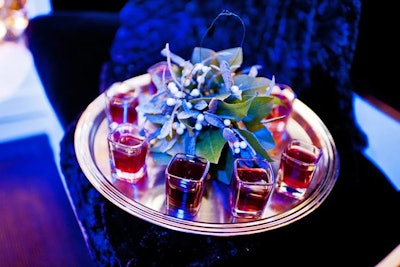 Servers greeted guests at the entrance with mistletoe shots, made with peppermint schnapps and pomegranate juice.