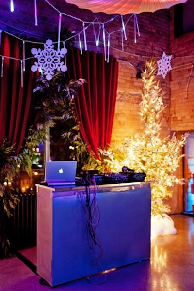 Icicle lights and snowflakes hung from the ceiling in the dance floor area.