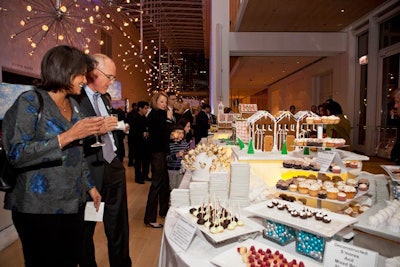 A sweets table held cupcakes, egg shells filled with gingerbread custard, whoopie pies, candy, and cake pops with protruding pretzel bits that looked like reindeer antlers.