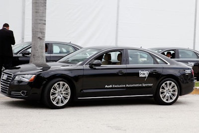 Outside of the custom-built pavilion, Design Miami logos covered the doors on the cars of exclusive automotive sponsor Audi.