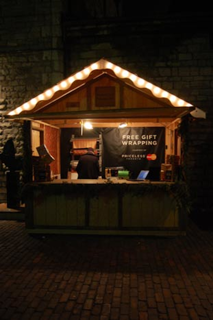 MasterCard offered complimentary gift-wrapping to guests who used their MasterCard to purchase items at the market.