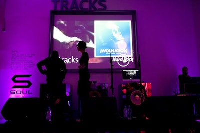 On the stage for the Tracks component of the 'Sound of Your Stay' program, event guests could browse playlists on computers and listen to them using the Soul by Ludacris headphones.