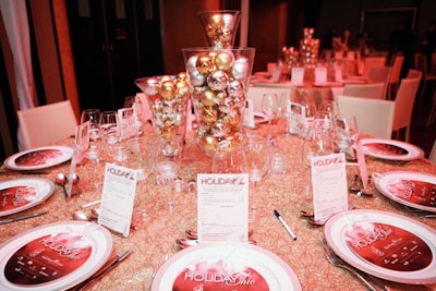 Gold-sequined tablecloths added shine, and menus at every plate looked like an ornament, tied with a ribbon at the top.