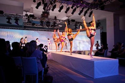 At the conclusion of the fourth routine, the dancer models transitioned off stage in preparation for the final scene, which used 3-D mapping and the introduction of the Speedo Fastskin 3 racing system.