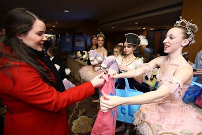 Dancers from the Maryland Youth Ballet posed with the children for photo ops and handed out gift bags.