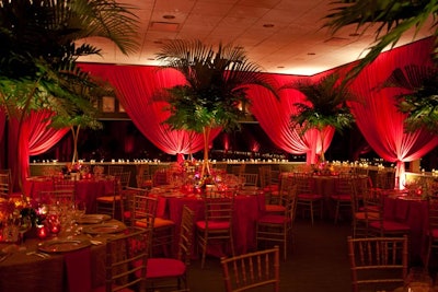 Palm leaves and bright pink hues lent a tropical feel to the room inspired by Rio de Janeiro.