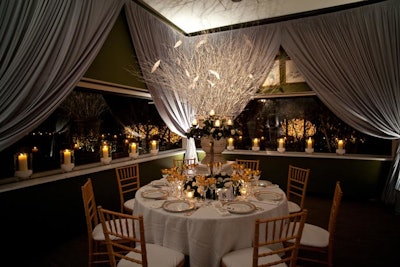 In the Stockholm room, centerpieces held sinuous silver branches.