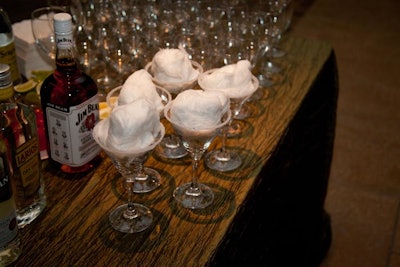 The specialty cocktail, known as 'The Polar Mist,' was a white cranberry martini poured over cotton candy, which quickly dissolved into the drink.