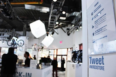 The magazine also encourages consumers to use Twitter and Facebook while at the store, using wall signage to promote its hashtag and Twitter handles.