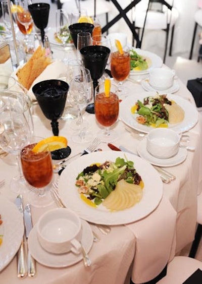 The hotel handled catering, serving a light repast of chicken breast with rice and julienne vegetables.