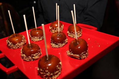 Staffers passed baked apples provided by Union Square Events while guests bowled.