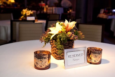 Winston Flowers designed small, woodsy arrangements to spruce up tabletops.