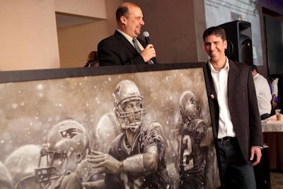 One auction prize was a large painting of local football hero Tom Brady, by painter Brian Fox.