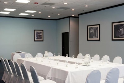 Black-and-white photography decorates the Gables room, which can hold 170 for a reception.