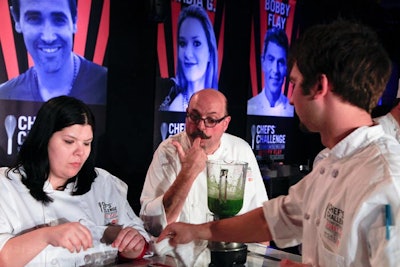 Chef Massimo Capra tasted his team's chervil pesto that would top a coffee and ancho chile-crusted filet of beef.