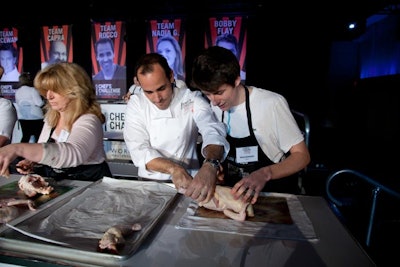 Chef David Rocco helped out a member of his team during the competition.