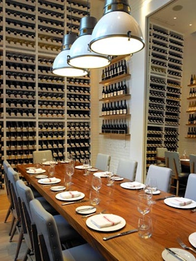 The private dining room has a floor-to-ceiling wine wall.