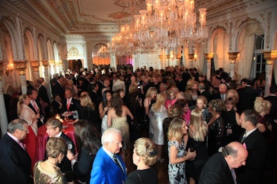 Guests mingled inside the more intimate white and gold ballroom for the cocktail reception.