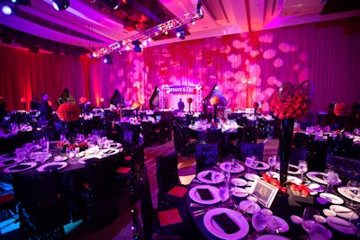 WowFactor Marketing Group used a dramatic black-and-red theme to transform the hotel’s 18,426-square-foot Metropolitan Ballroom for the gala.