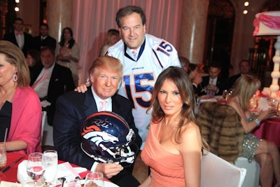 Palm Beach resident, Dr. Dave Dodson, posed with Donald and Melania Trump and their newly won autographed Tim Tebow helmet.