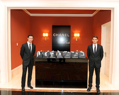 In addition to the Chanel goodie bags that awaited them on the private planes and in their hotel rooms, guests received take-home treats as they left dinner.