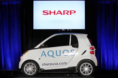 Eventage produced Sharp's Monday press conference, where its 80-inch TV was unveiled atop a Smart Car to show just how large it was. During the week, the car was driven around Las Vegas with a prop TV on top; anyone who tweeted a picture of it was entered to win the new television.