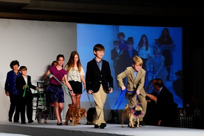Pawpurrazzi co-chair Bunny Bastian and her family walked their dogs in the 'Great Pets Who Walk in Front of Great People' show.