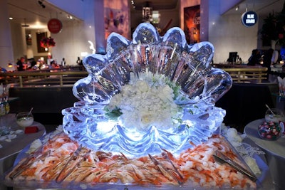 A clam-shaped ice sculpture crowned the seafood buffet.