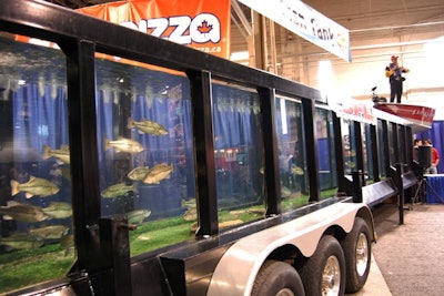 At the Great Canadian Fish Tank, professional angler Italo Labignan showed guests how different lures attracted fish. The seminar stage—two boats on either end of the fish tank—featured programming every day.