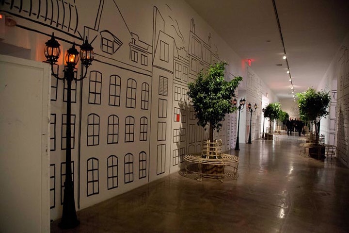 The design concept touched all areas of Skylight SoHo's 15,000-square-foot interior, including the hallway, which Target remodeled into a Parisian-style boulevard with lampposts, painted illustrations of buildings, and trees surrounded by benches.