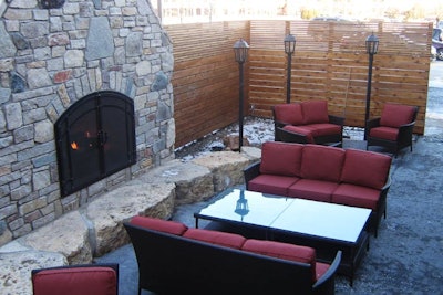 With couches and a fireplace, a terrace has a 95-capacity and is available for private events on a limited basis.