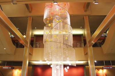 The entrance's 'Light of Nations' sculpture has 193 individual hand-blown glass bulbs to represent members of the United Nations.