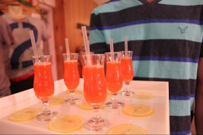 Servers wearing striped American Eagle T-shirts passed concert concession-style refreshments, including chilled strawberry lemonade.