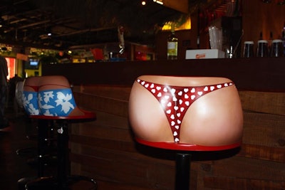 The company calls its bar stools 'butt stools,' each one painted with a different bathing suit.