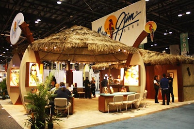 Hawaiian sunglass-maker Maui Jim topped its 40- by 60-foot booth with a tiki hut-style roof. In addition to six open work stations, the booth included enclosed offices where brand representatives could conduct business in quieter surroundings.