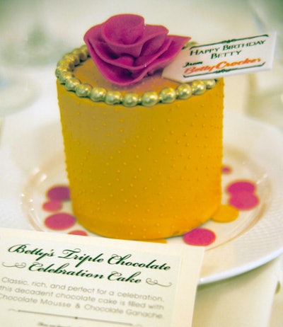 Guests received individual chocolate cakes at their place settings.