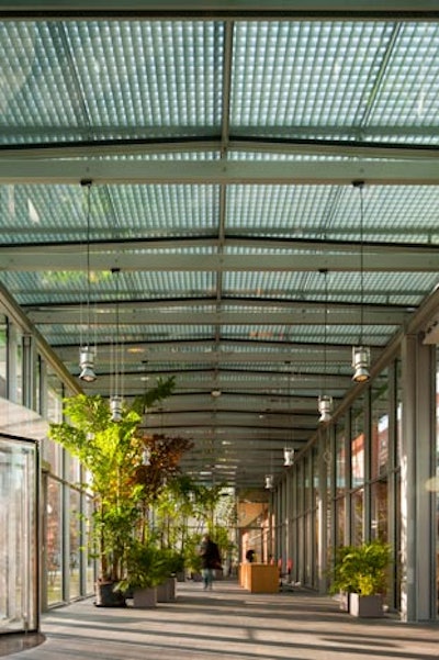 A new museum entrance faces Evans Way Park and leads to the glass-enclosed Bekenstein Family lobby.